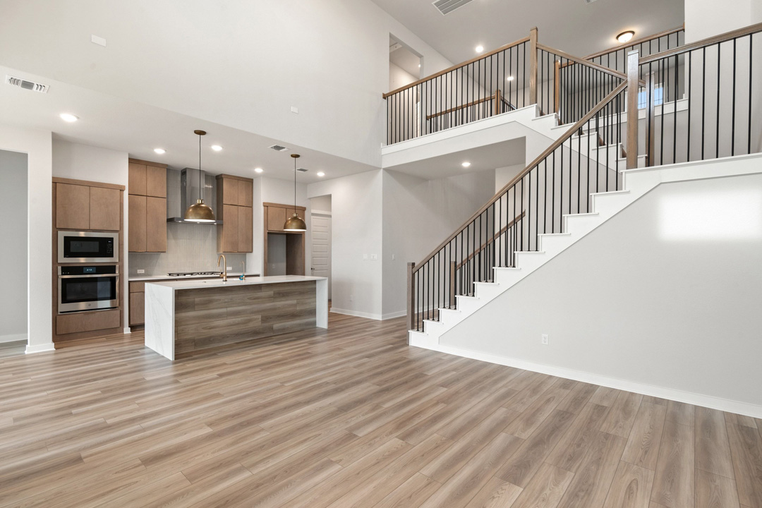 16209 Smithers Road Manor, TX 78653 - Photo 11 of 38 a view of kitchen and kitchen with wooden floor