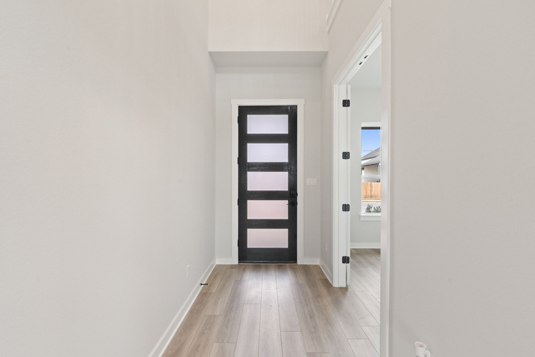 16209 Smithers Road Manor, TX 78653 - Photo 3 of 38 wooden floor in an empty room