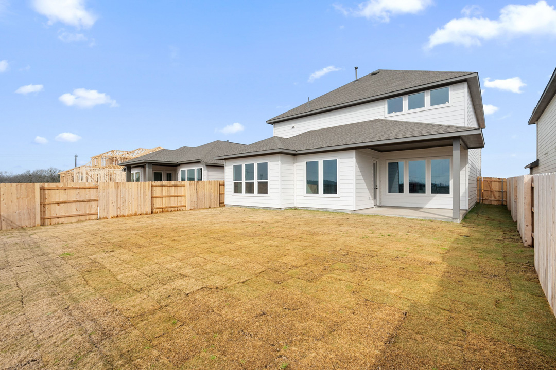16209 Smithers Road Manor, TX 78653 - Photo 35 of 38 a house with swimming pool in front of it