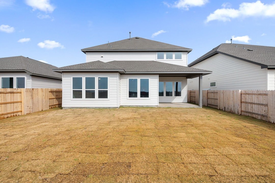 16209 Smithers Road Manor, TX 78653 - Photo 36 of 38 a house with swimming pool in front of it