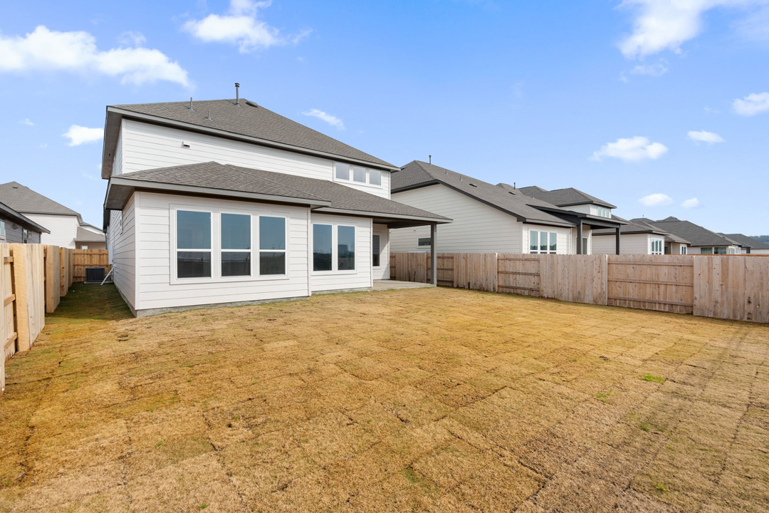 16209 Smithers Road Manor, TX 78653 - Photo 38 of 38 a house with yard in front of it