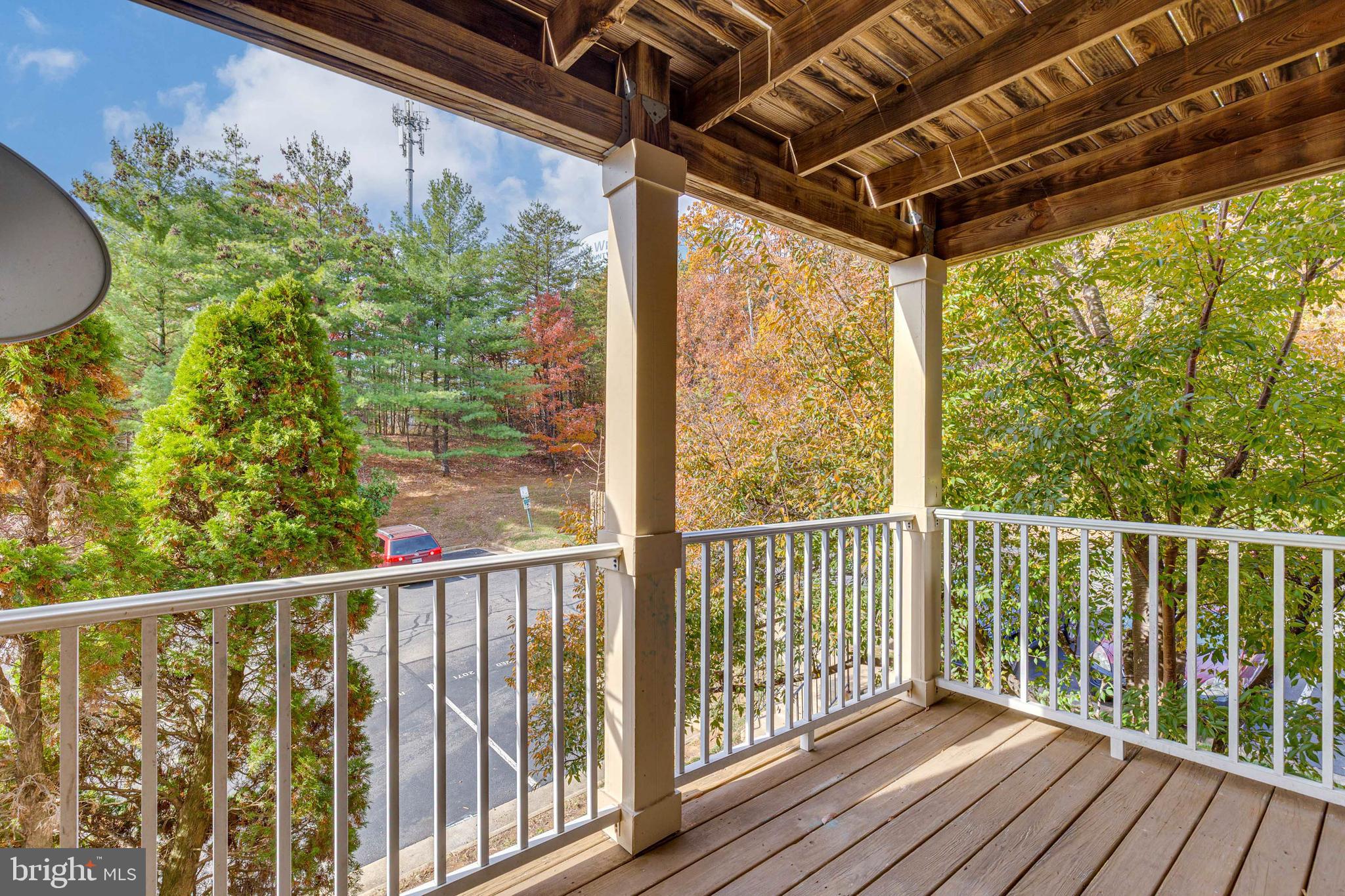 1049 Gardenview Loop, Unit 301 Woodbridge, VA 22191 - Photo 25 of 25 a view of a balcony with wooden floor