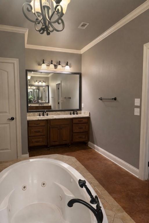 252 Tanner Street Stonewall, LA 71078 - Photo 15 of 34 a bathroom with a tub sink and mirror