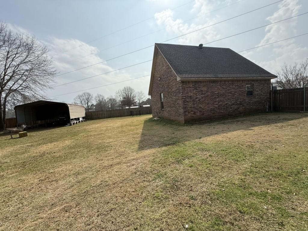 252 Tanner Street Stonewall, LA 71078 - Photo 33 of 34 a front view of a house with a yard