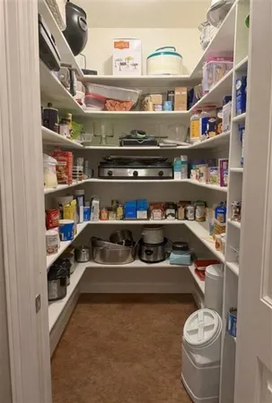 a kitchen with a lot of cabinets and a sink
