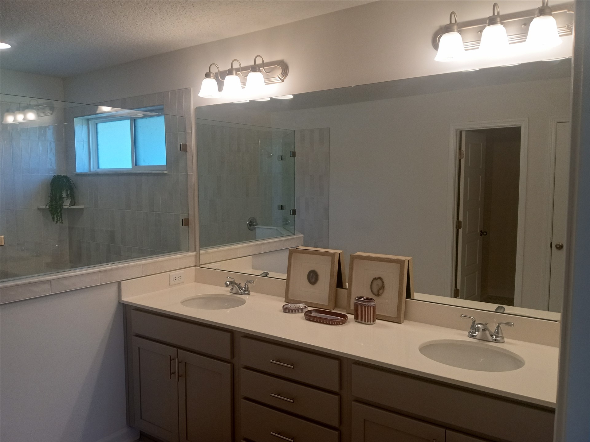96052 Pirates Bluff Road Yulee, FL 32097 - Photo 20 of 22 a bathroom with a sink and a mirror