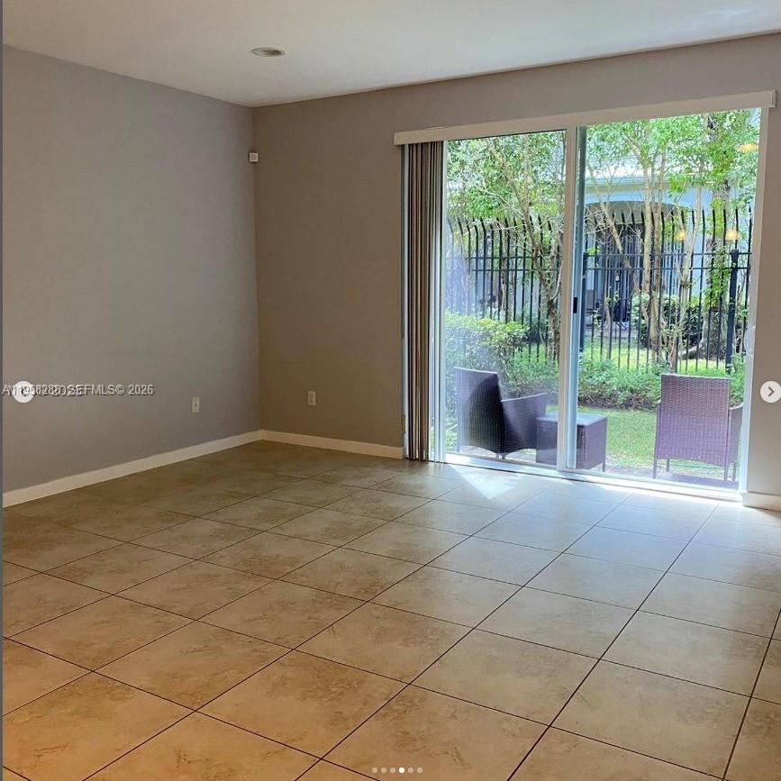 2574 Southwest 81st Terrace, Unit 2564 Miramar, FL 33025 - Photo 18 of 19 a view of an empty room and window