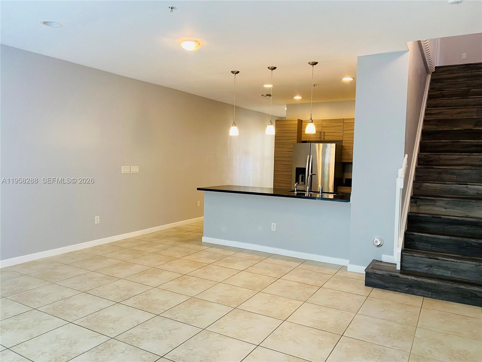 2574 Southwest 81st Terrace, Unit 2564 Miramar, FL 33025 - Photo 3 of 19 a view of a hallway with wooden floor