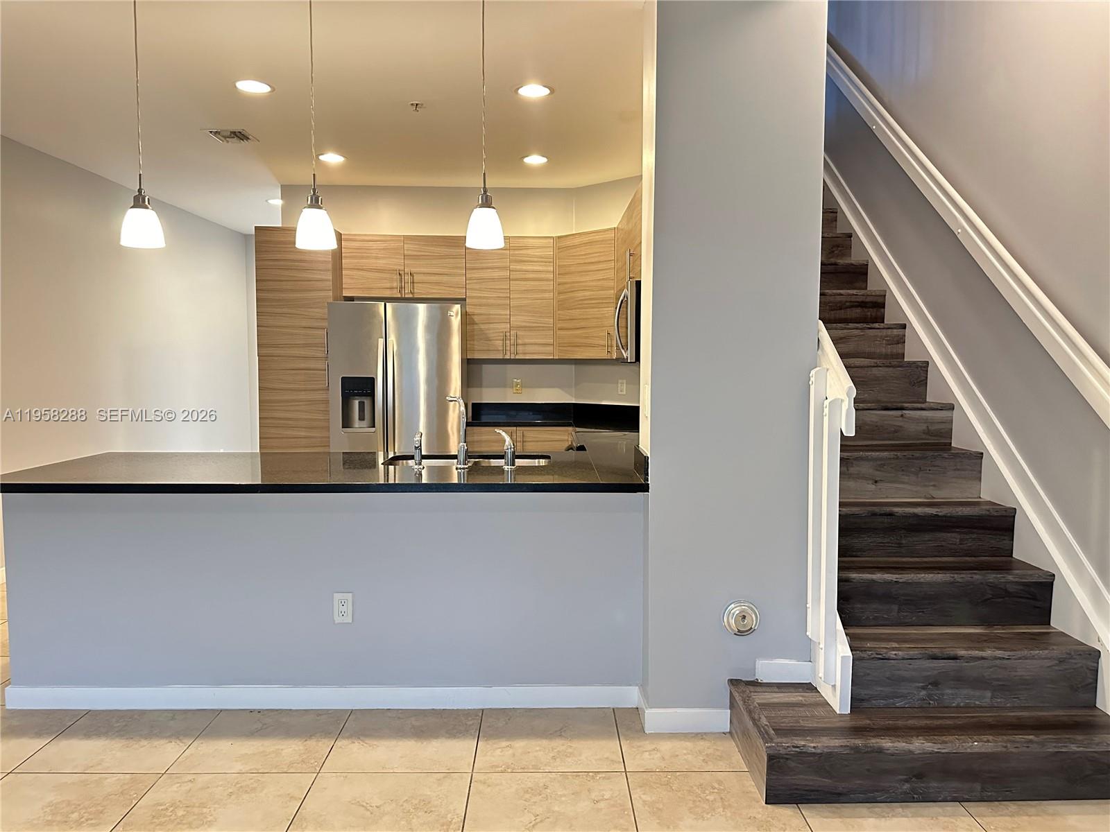 2574 Southwest 81st Terrace, Unit 2564 Miramar, FL 33025 - Photo 5 of 19 a view of entryway and hall with wooden floor