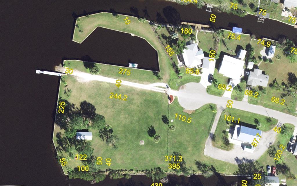 397 Omen Street Punta Gorda, FL 33982 - Photo 3 of 3 an aerial view of a residential houses with outdoor space