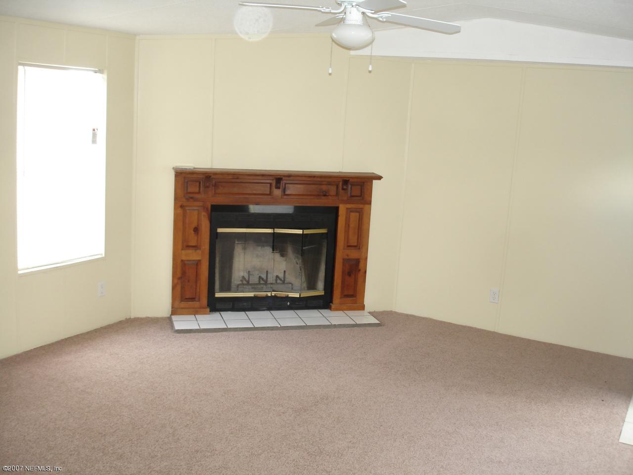 604 Hoover Road Palatka, FL 32177 - Photo 2 of 6 Living Room with fireplace