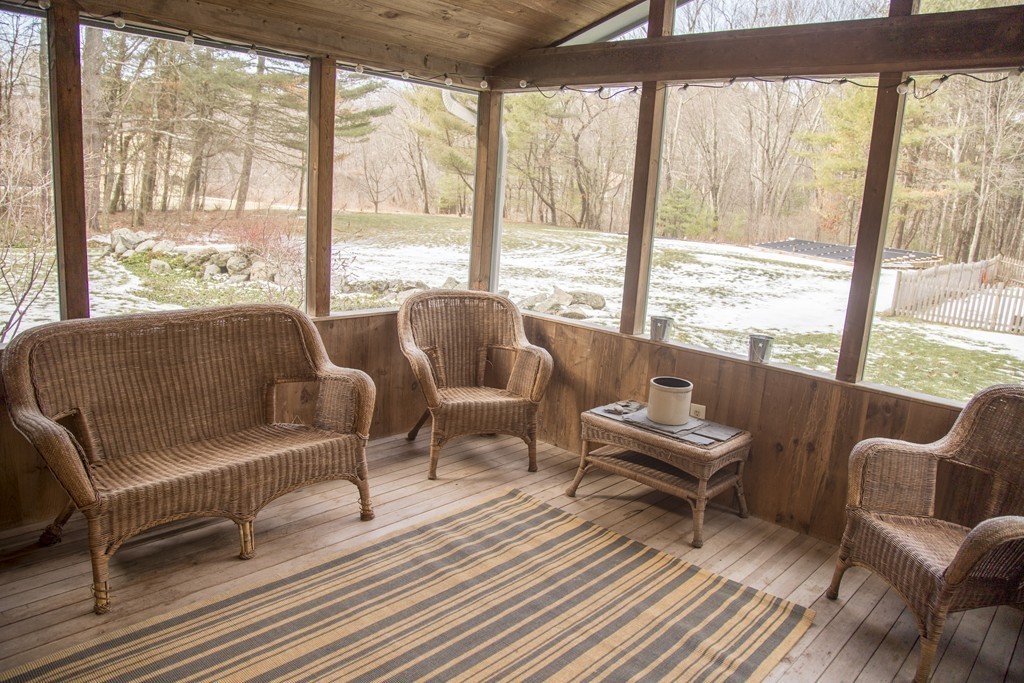 275 Littleton Road Harvard, MA 01451 - Photo 14 of 17 a living room with furniture and a large window