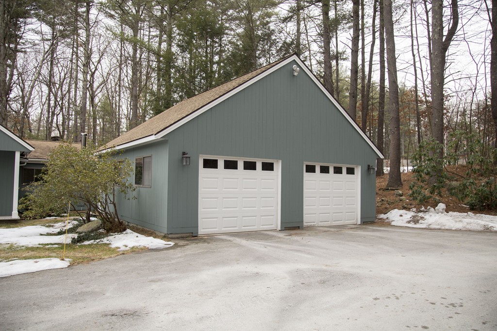 275 Littleton Road Harvard, MA 01451 - Photo 17 of 17 a house with trees in the background
