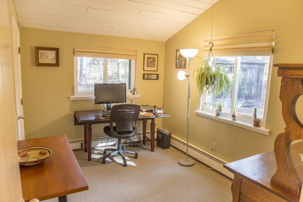 275 Littleton Road Harvard, MA 01451 - Photo 8 of 17 a view of a workspace with furniture and a window