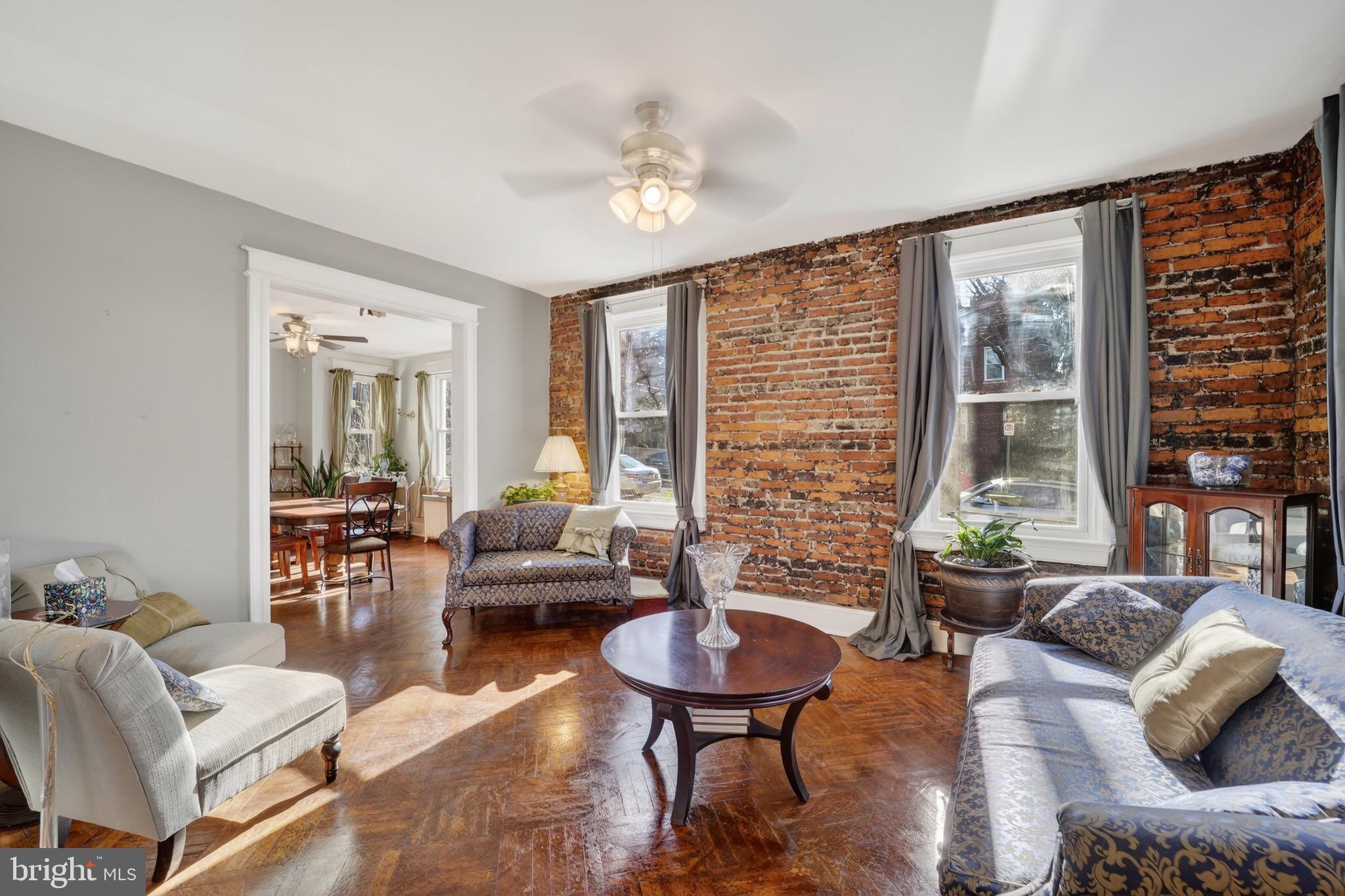 4301 4th Street Northwest Washington, DC 20011 - Photo 11 of 65 a living room with furniture and a large window