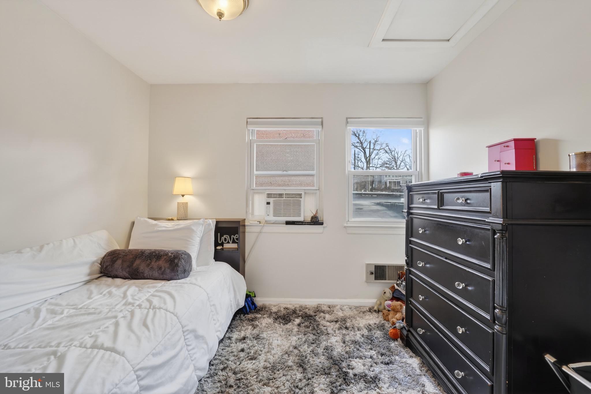 4301 4th Street Northwest Washington, DC 20011 - Photo 34 of 65 a bedroom with a bed and a cabinets