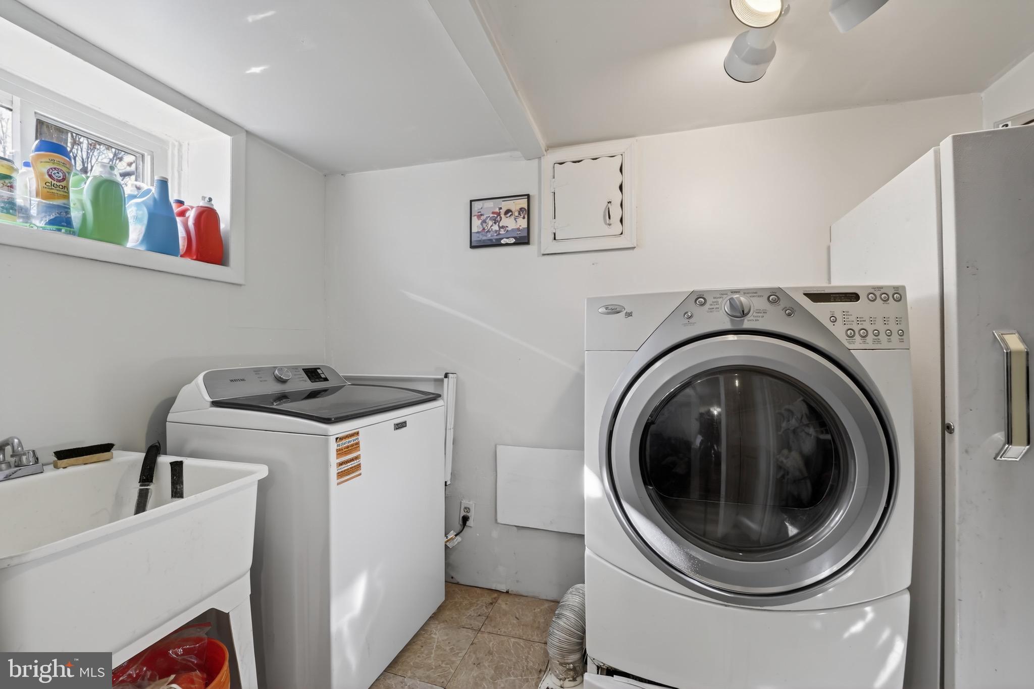 4301 4th Street Northwest Washington, DC 20011 - Photo 50 of 65 a utility room with dryer and washer