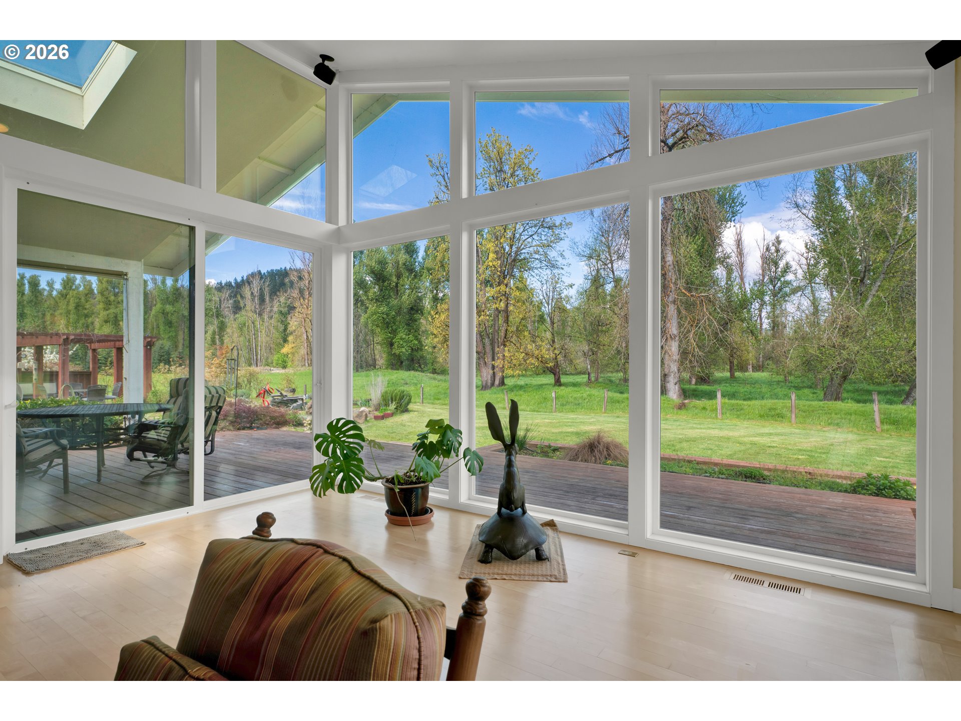 7924 Thurston Road Springfield, OR 97478 - Photo 15 of 45 a bedroom with furniture and large windows
