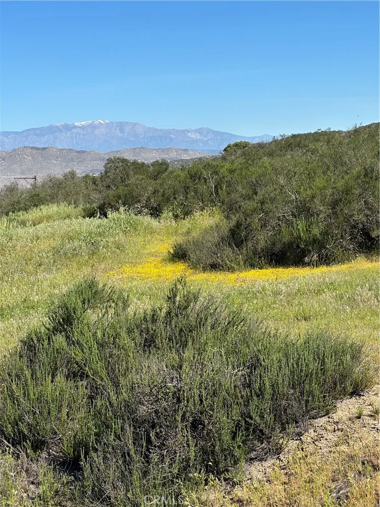 0 Red Mountain Road Hemet, CA 92544 - Photo 5 of 16 a view of a lake with mountains in the background