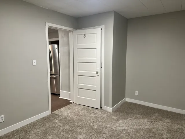 wooden floor and closet in a room