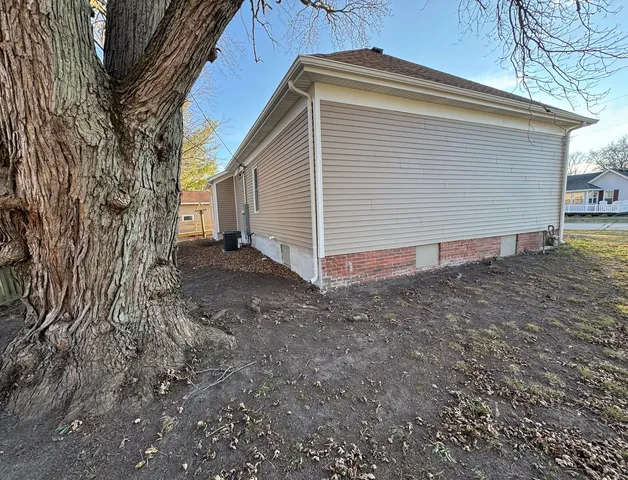 a view of backyard of house