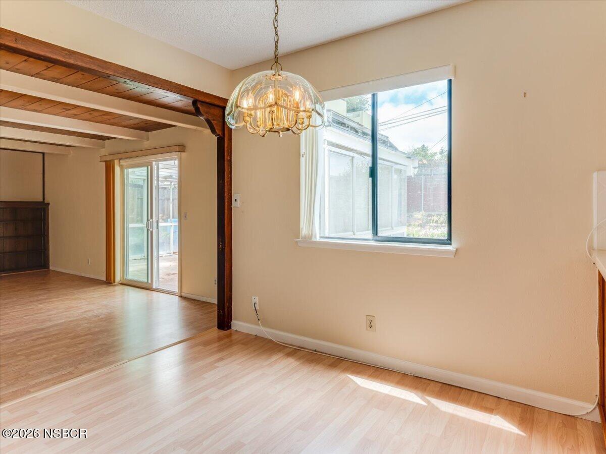 360 Tallyho Road Santa Maria, CA 93455 - Photo 23 of 72 a view of empty room with wooden floor and fan