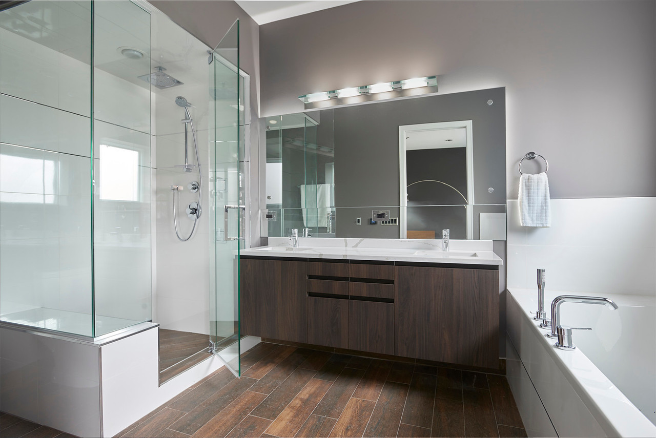 Undisclosed Address Chicago, IL 60622 - Photo 12 of 24 a bathroom with a tub sink shower and mirror