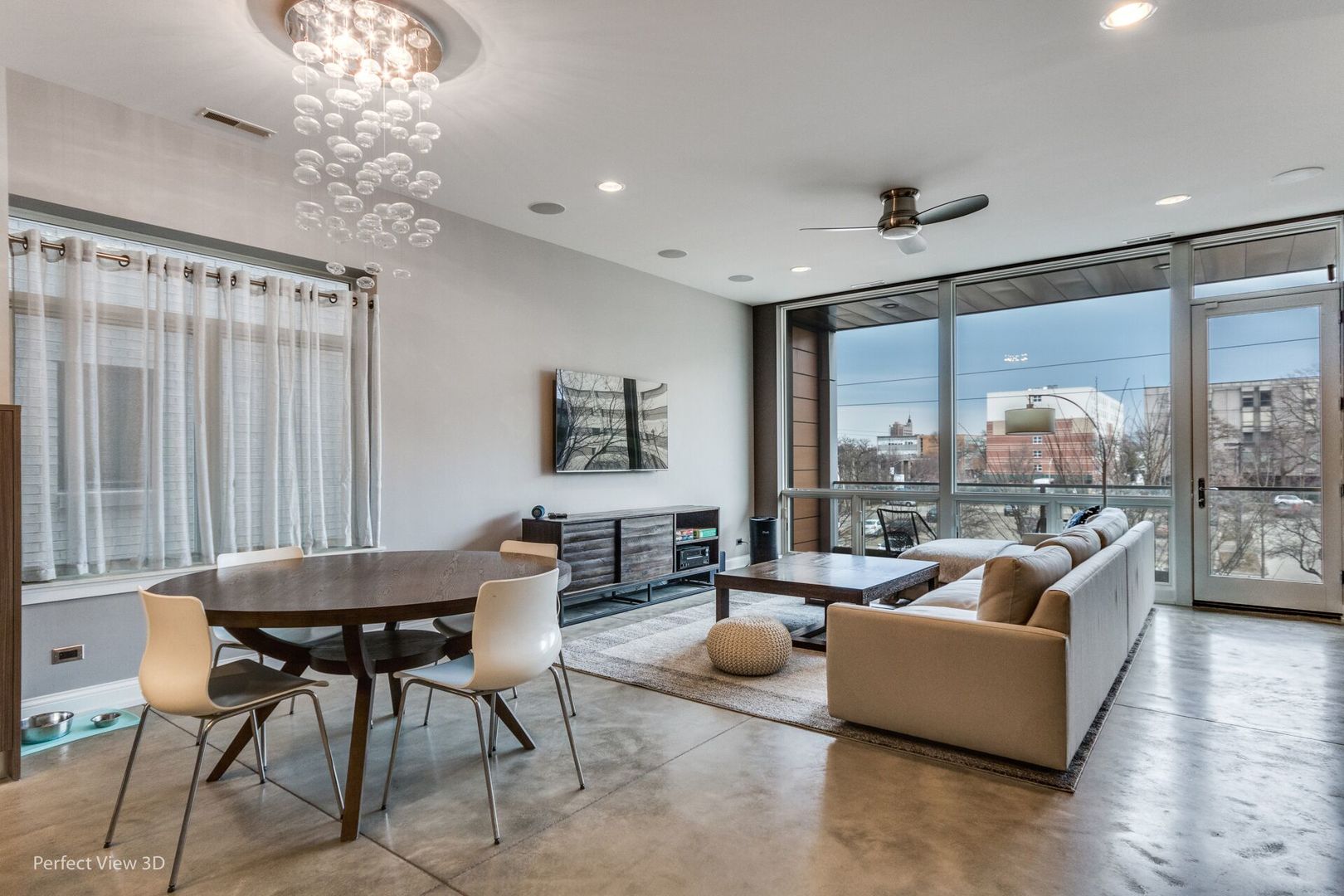 Undisclosed Address Chicago, IL 60622 - Photo 4 of 24 a living room with furniture and a large window
