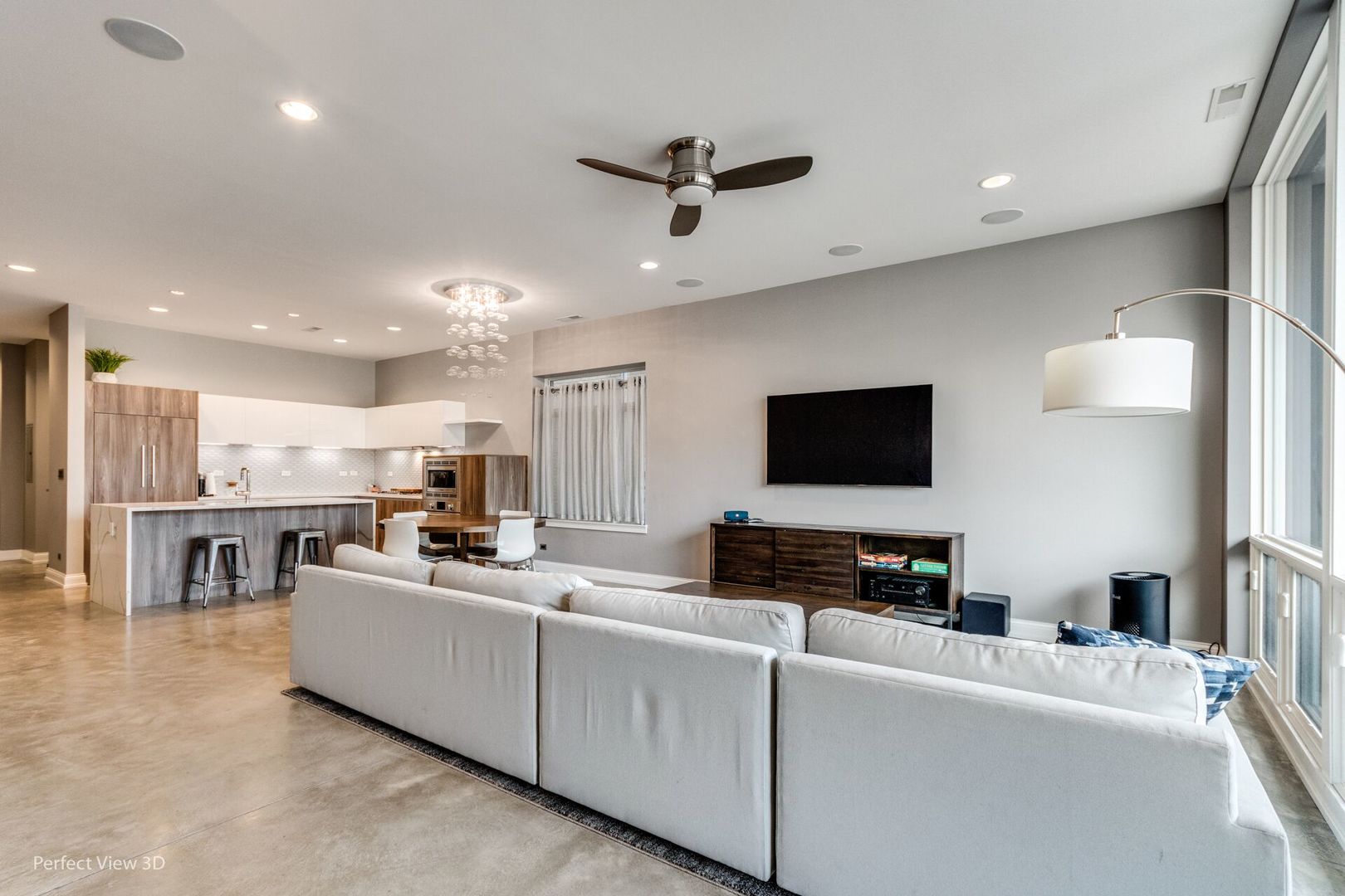 Undisclosed Address Chicago, IL 60622 - Photo 5 of 24 a living room with furniture and a flat screen tv