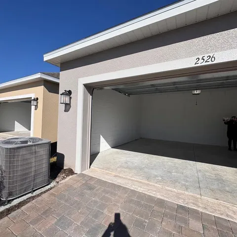 a view of empty room with windows
