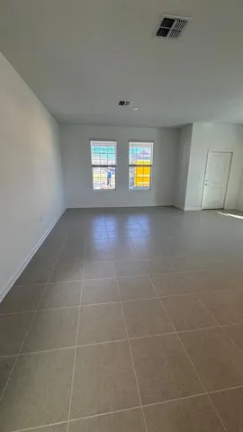 a kitchen with a sink stove and refrigerator