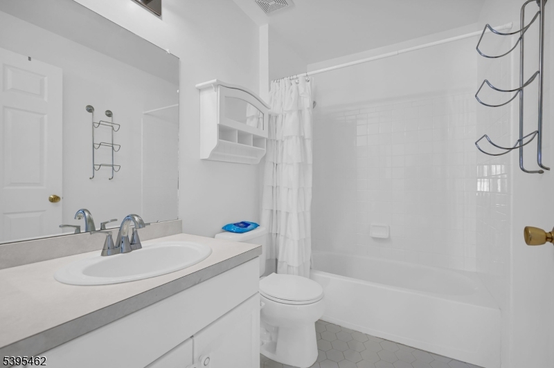 11 Timothy Court Morristown, NJ 07960 - Photo 29 of 30 a bathroom with a sink toilet and shower