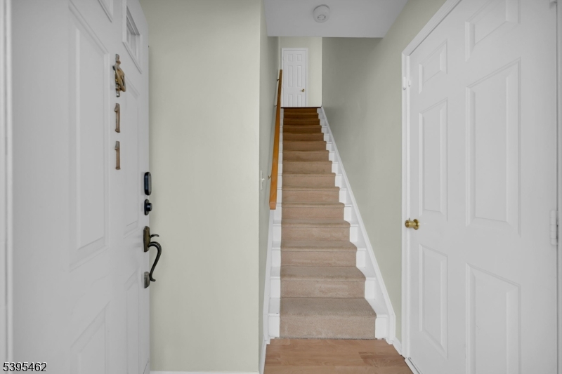 11 Timothy Court Morristown, NJ 07960 - Photo 5 of 30 a view of a hallway with staircase