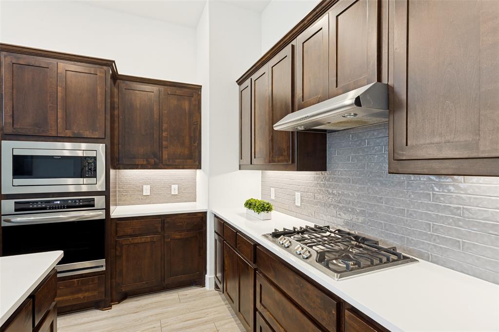 14937 Nightmist Road Aledo, TX 76008 - Photo 12 of 25 Kitchen features a gas cooktop