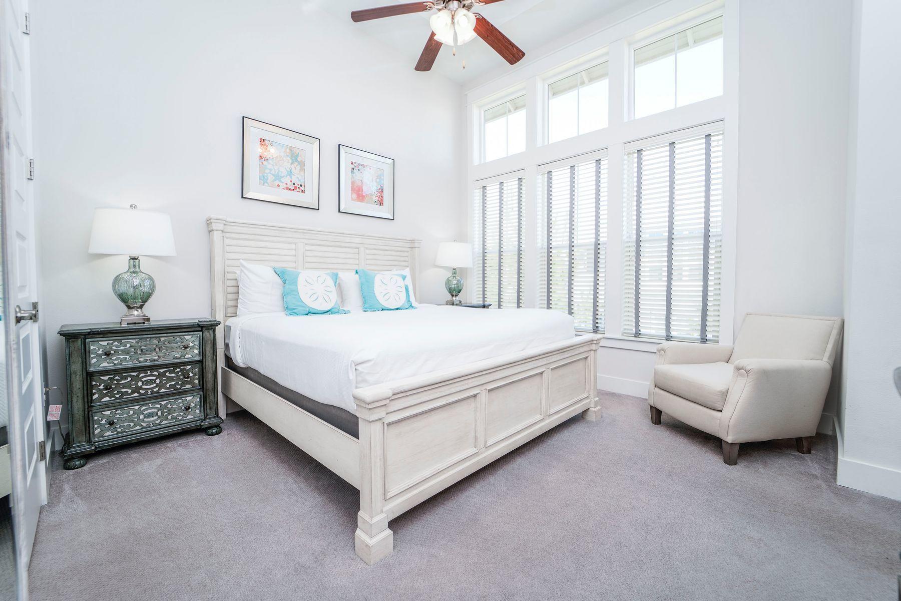 58 York Ln Inlet Beach, Unit B Inlet Beach, FL 32461 - Photo 10 of 24 a bed sitting in a bedroom next to a window