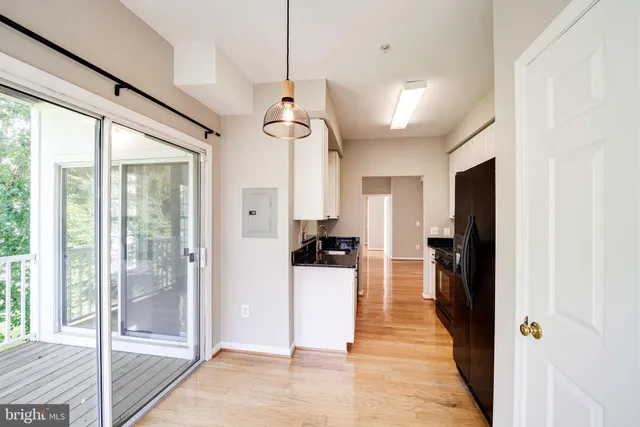 a view of a living room and a chandelier
