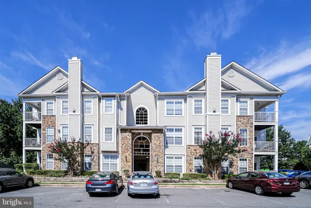 a car parked in front of a house