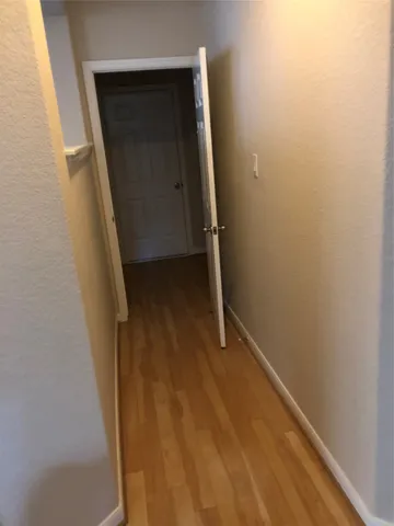 a view of hallway with stairs