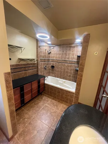 a bathroom with a bathtub