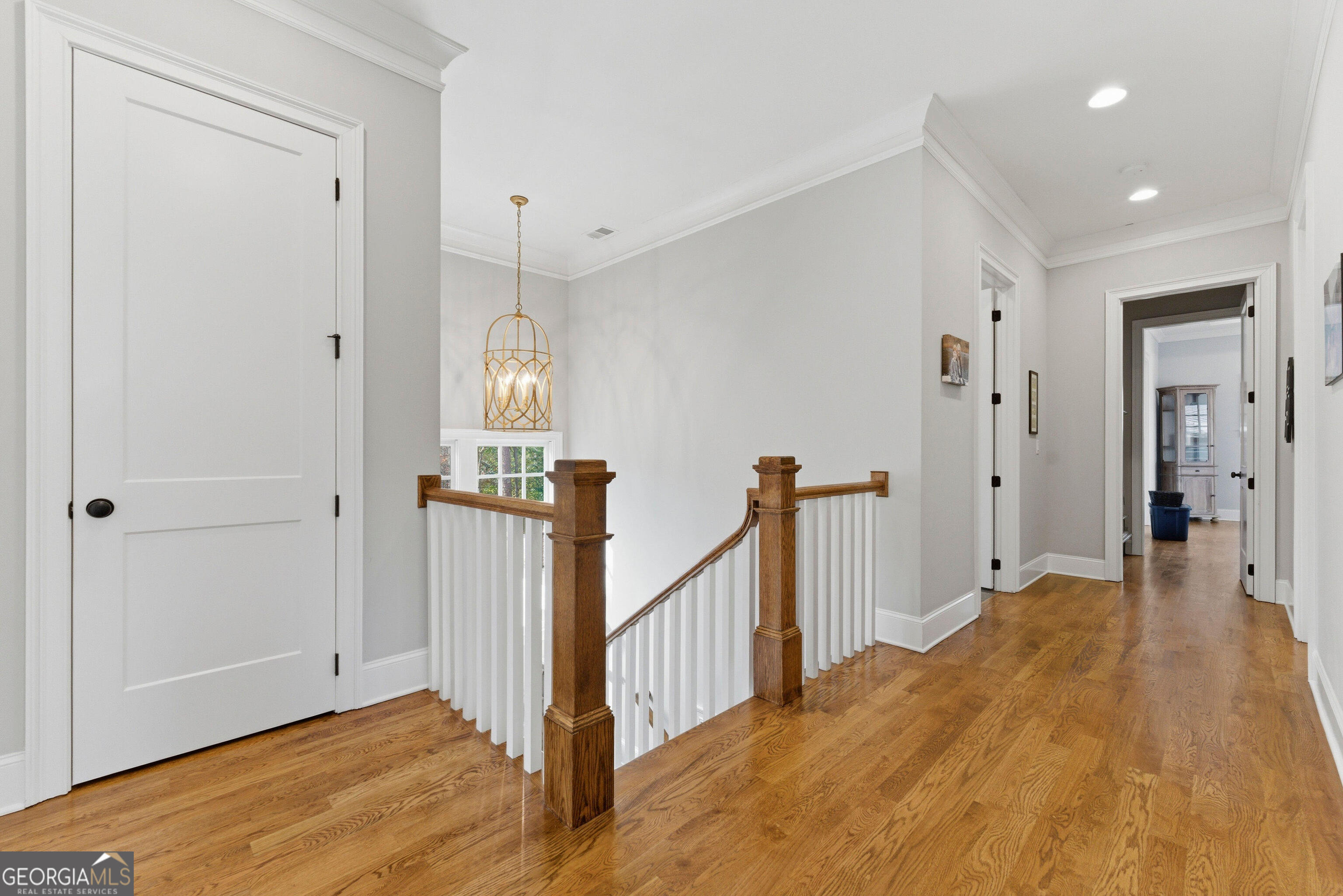 1205 Oldfield Road Decatur, GA 30030 - Photo 11 of 37 a view of a hallway with wooden floor and staircase