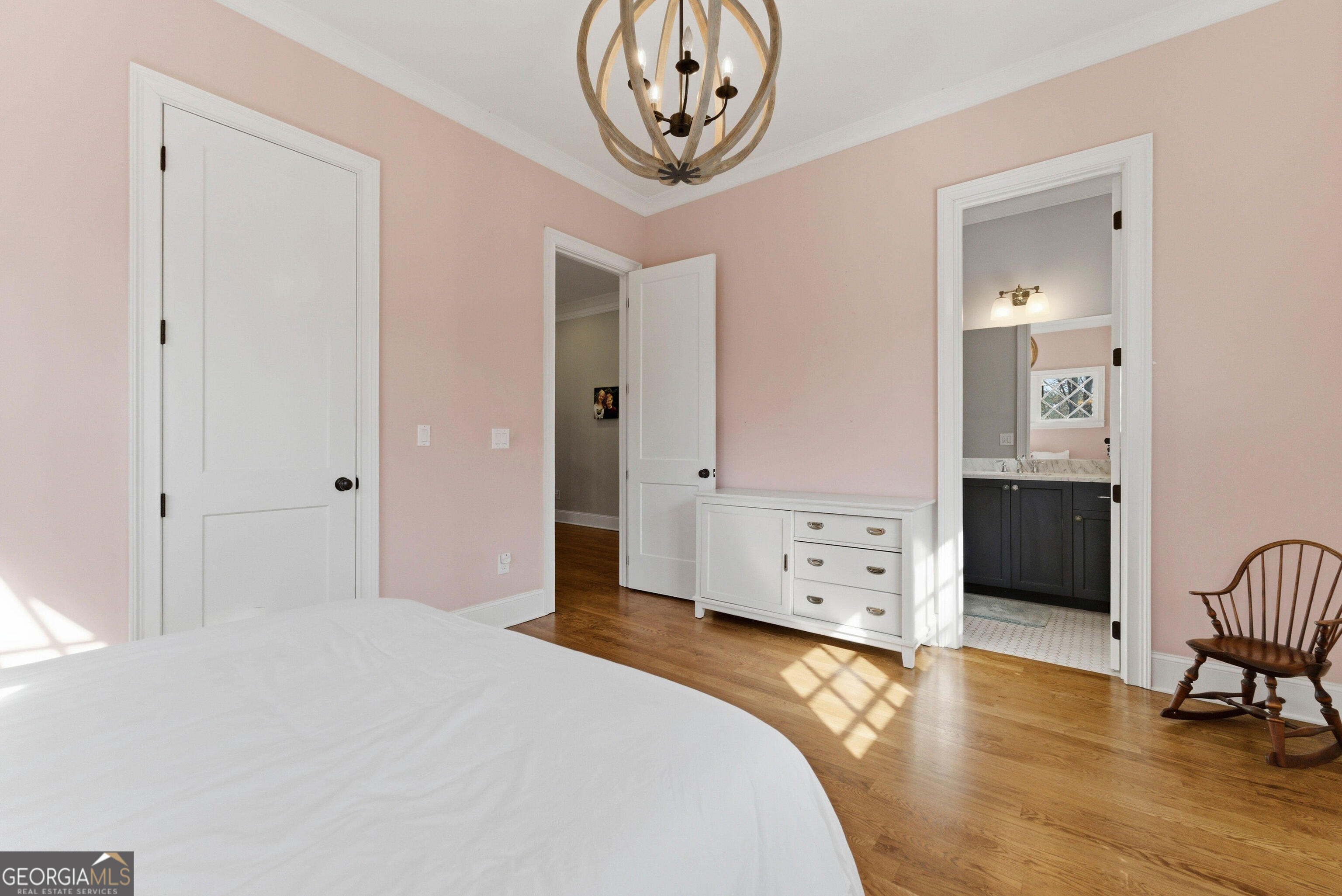 1205 Oldfield Road Decatur, GA 30030 - Photo 13 of 37 a bedroom with a bed and a chandelier