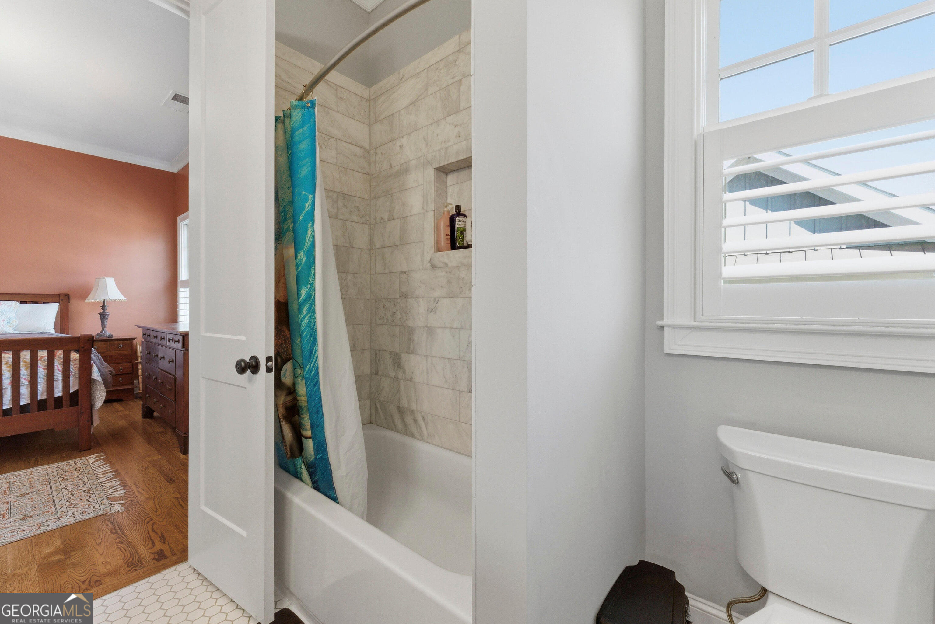 1205 Oldfield Road Decatur, GA 30030 - Photo 18 of 37 a bathroom with a bathtub and a shower