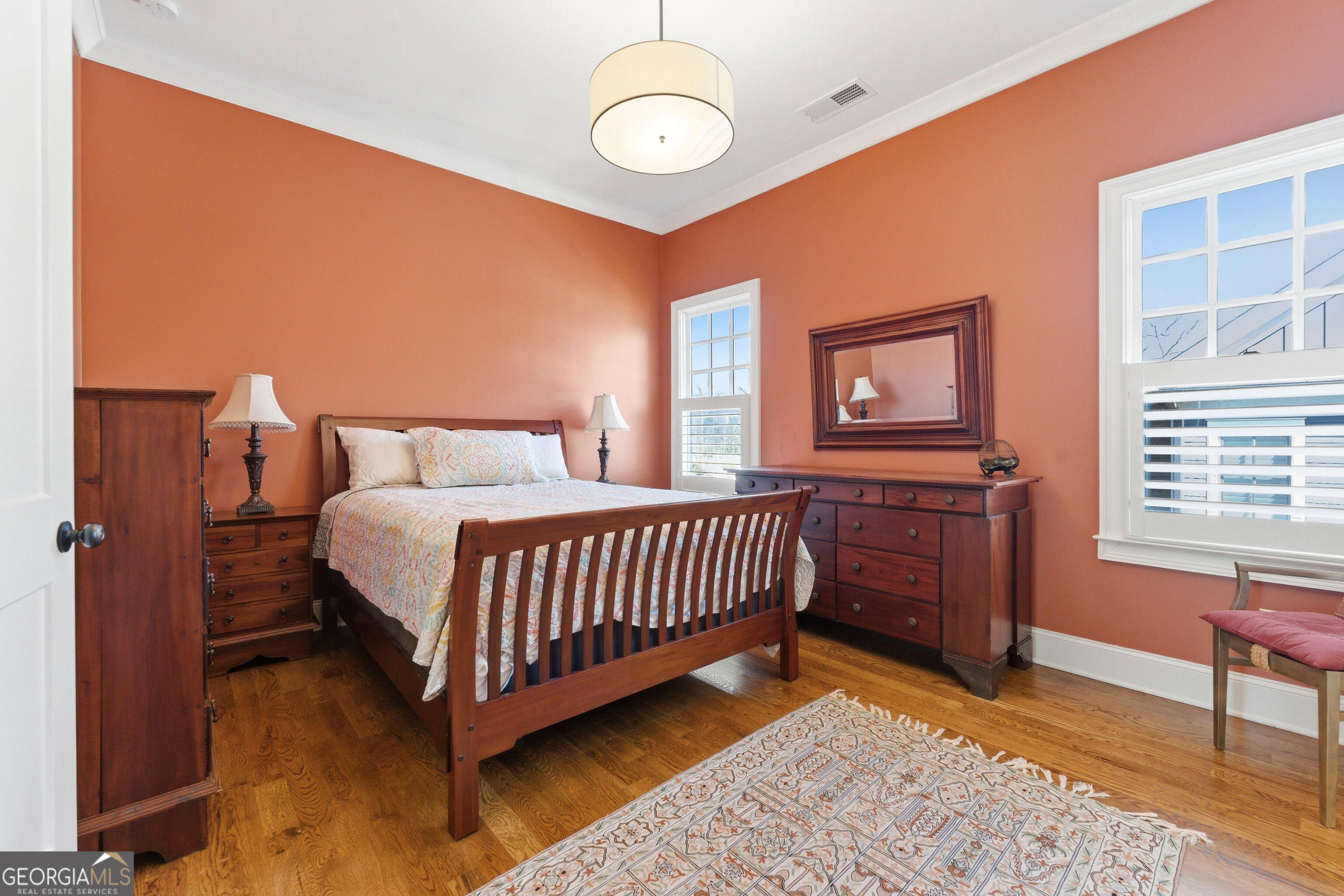 1205 Oldfield Road Decatur, GA 30030 - Photo 19 of 37 a bedroom with a bed and window