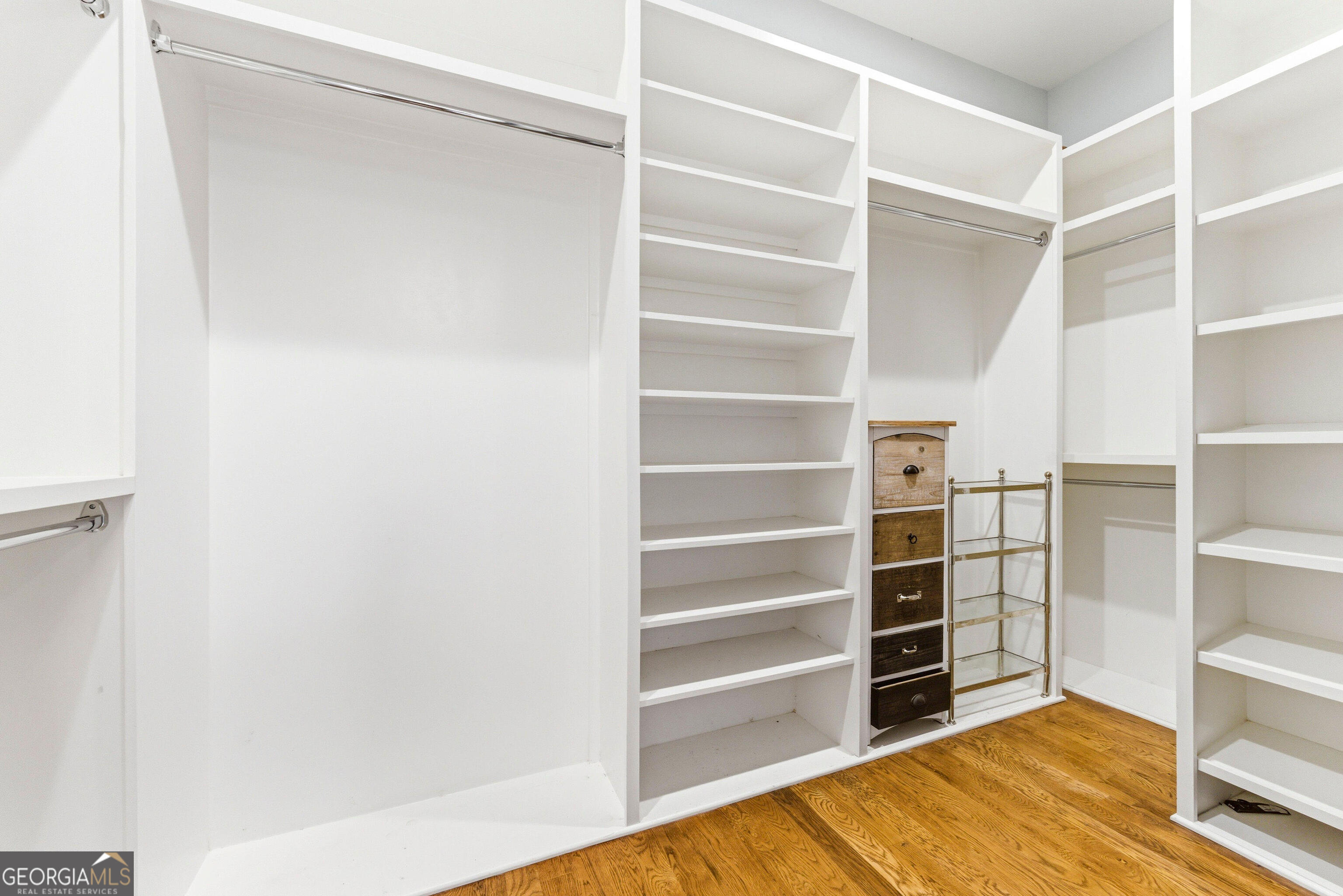 1205 Oldfield Road Decatur, GA 30030 - Photo 28 of 37 a view of walk in closet with empty racks