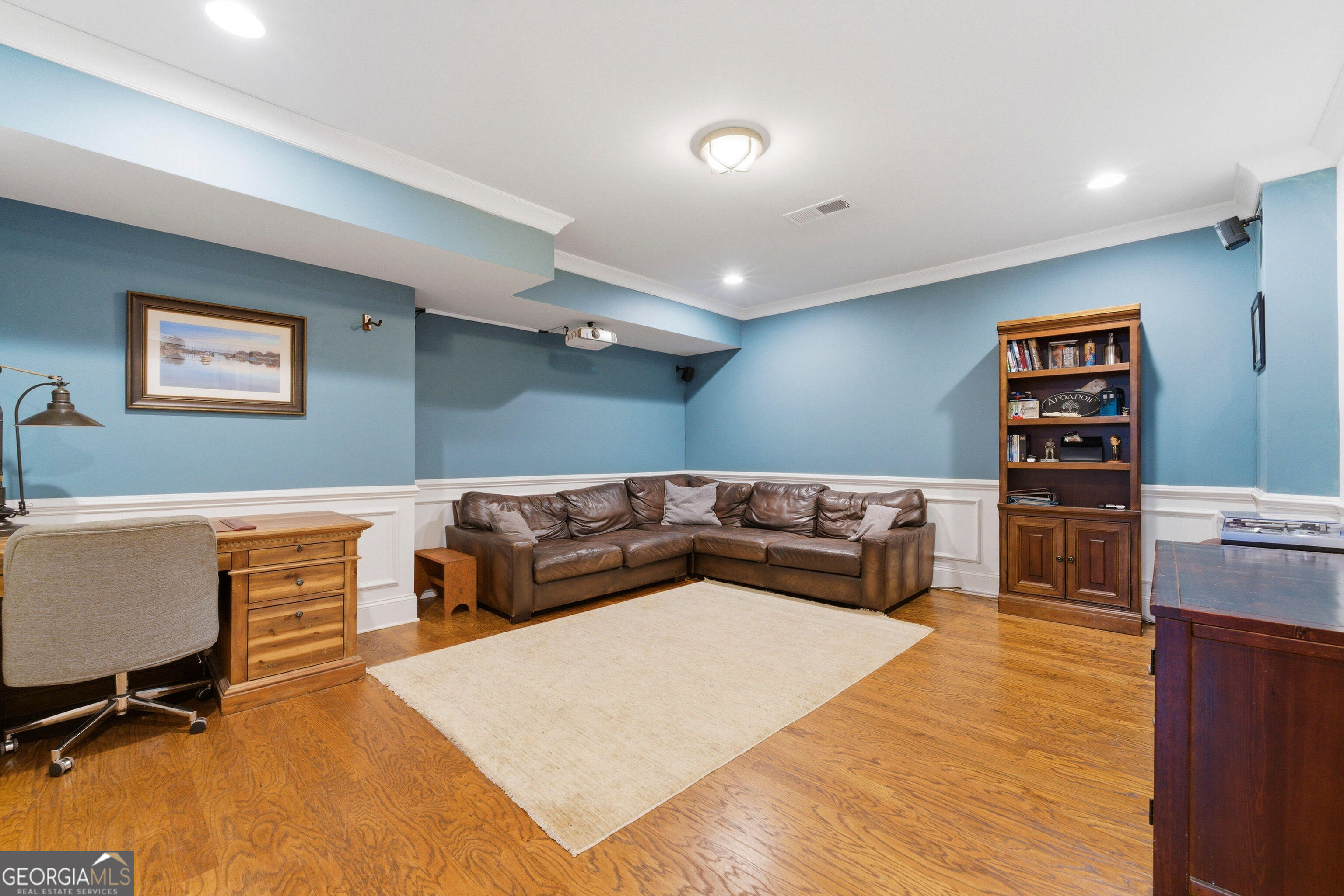 1205 Oldfield Road Decatur, GA 30030 - Photo 31 of 37 a living room with furniture and a flat screen tv