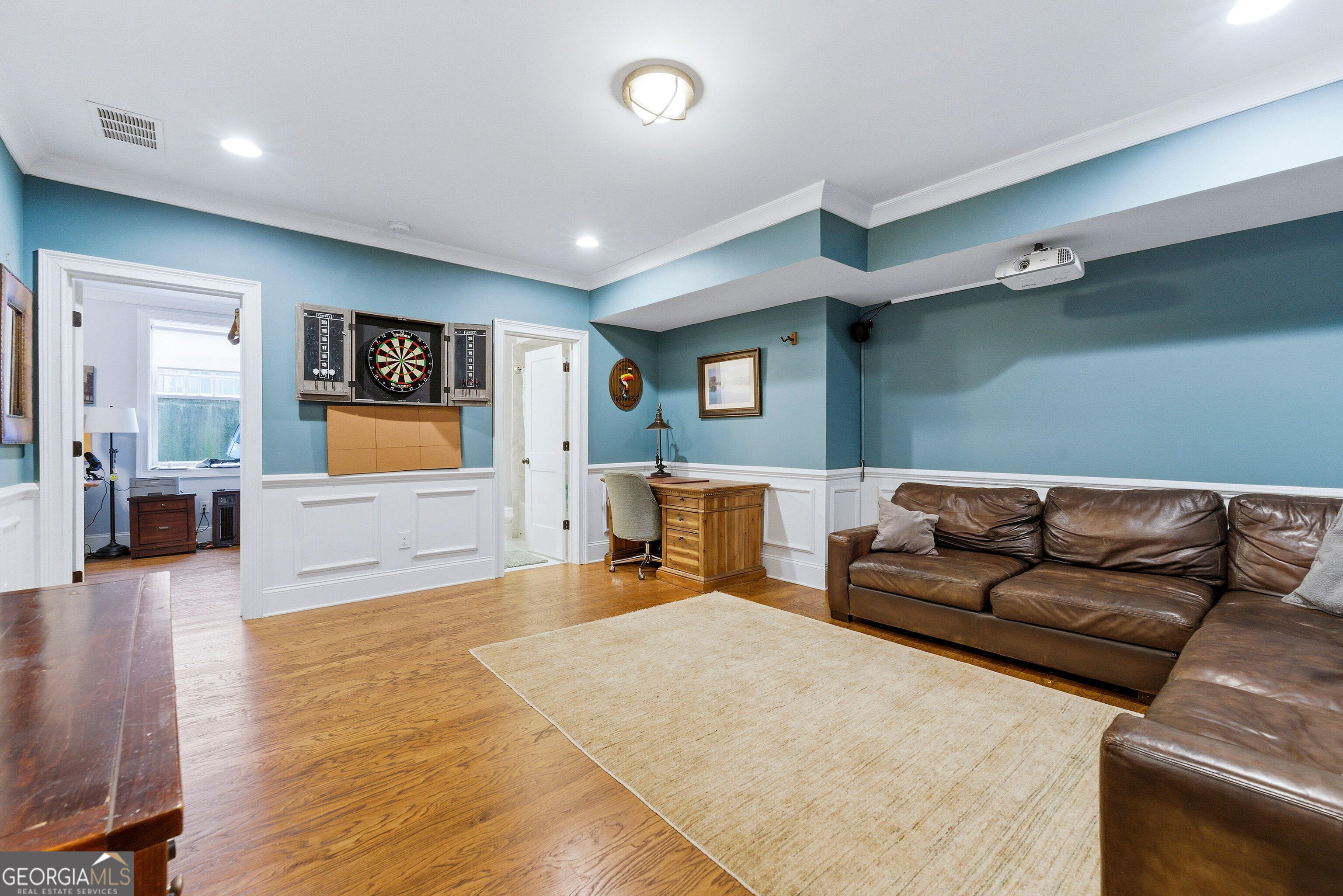 1205 Oldfield Road Decatur, GA 30030 - Photo 32 of 37 a living room with furniture and a flat screen tv