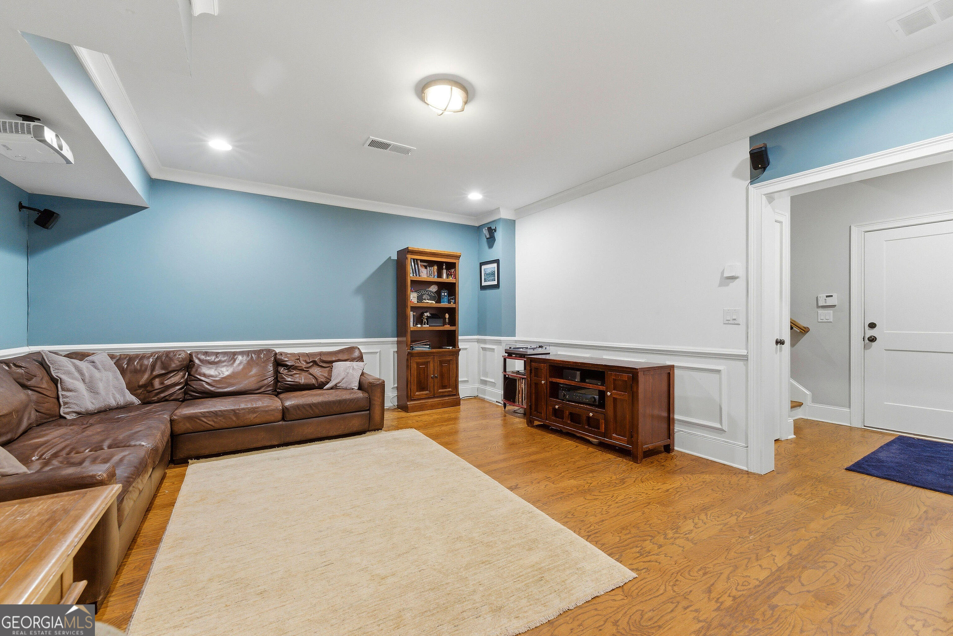 1205 Oldfield Road Decatur, GA 30030 - Photo 33 of 37 a living room with furniture and a flat screen tv