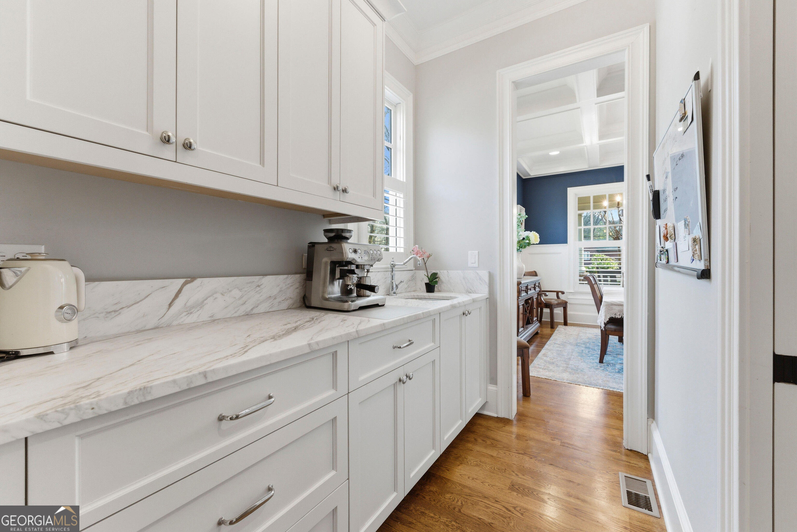 1205 Oldfield Road Decatur, GA 30030 - Photo 8 of 37 a kitchen with granite countertop white cabinets and sink