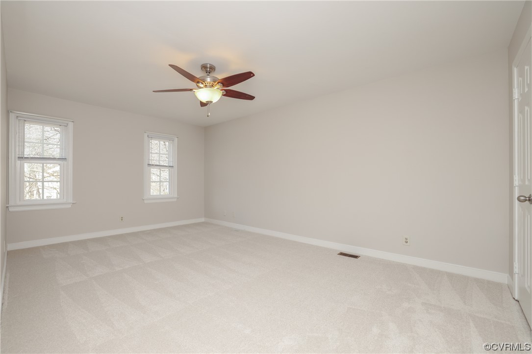 13802 Garrison Pl Drive Midlothian, VA 23112 - Photo 23 of 47 an empty room with windows and fan fan