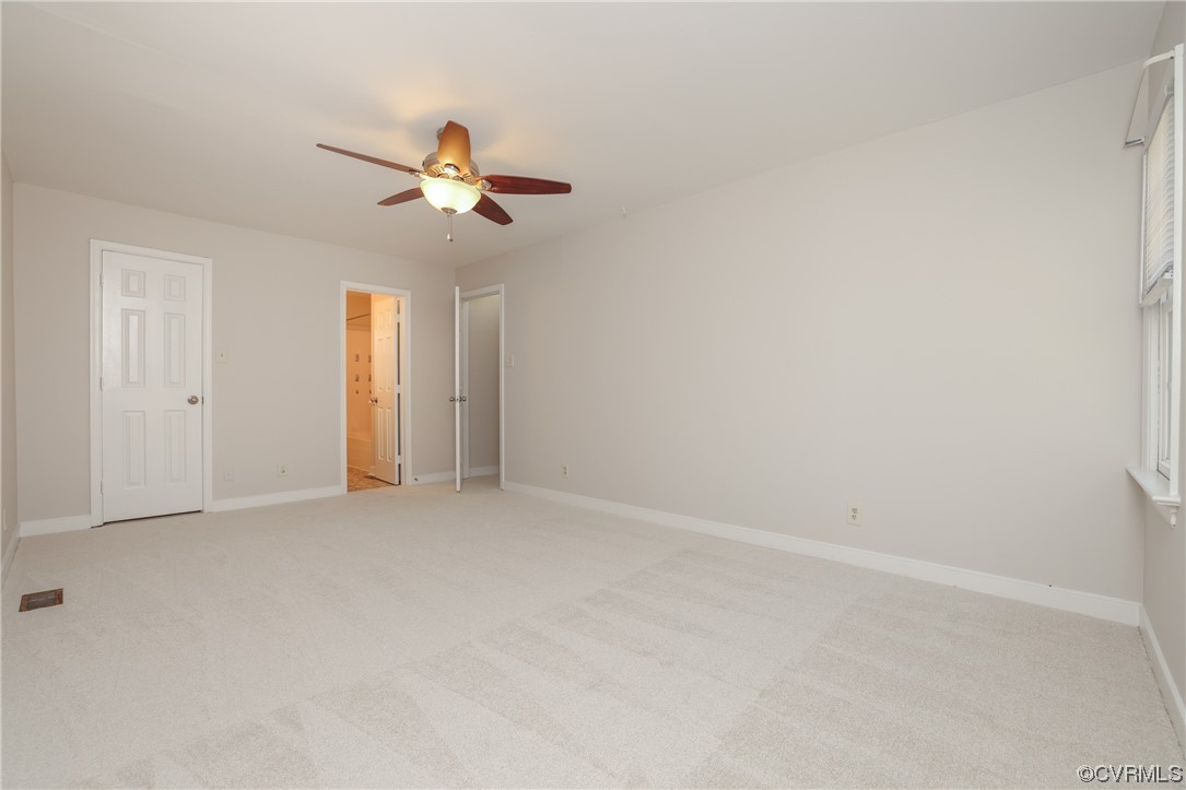 13802 Garrison Pl Drive Midlothian, VA 23112 - Photo 24 of 47 an empty room with windows and fan